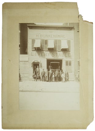 Item #18169 H. Bunkenburg Livery Stable: photo of building with employees in front