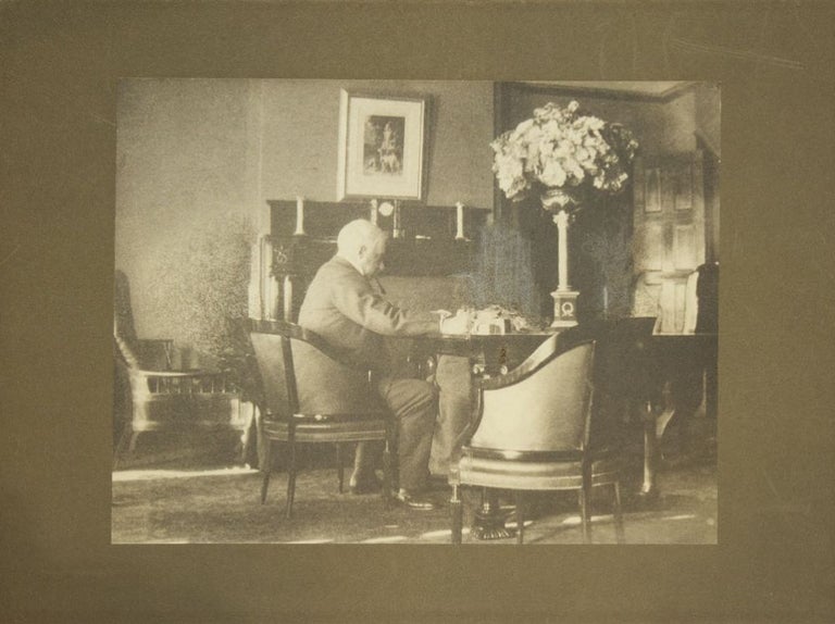 Item #218231 Photograph of J.P. Morgan seated at his desk, in profile. J. Pierpont Morgan.