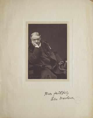 Item #238445 Portrait photograph of author Ian Maclaren, three-quarters length seated, in jacket...