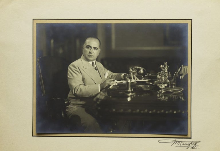 Item #241496 Portrait Photograph of President Getulio Vargas of Brazil (1882-1954) seated at his desk. Getulio Vargas, Max Rosenfeld, photographer.