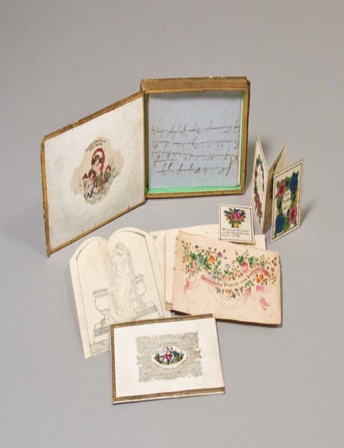 Collection of Autograph Sentiments in German, including Love Poems with drawings, preserved in a Green Velvet Book Box with Handcolored Sentimental Vignette on Upper Cover