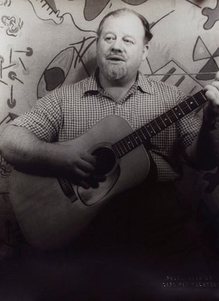 Item #261197 Portrait photograph of Burl Ives with guitar. Burl Ives, Carl Van Vechten