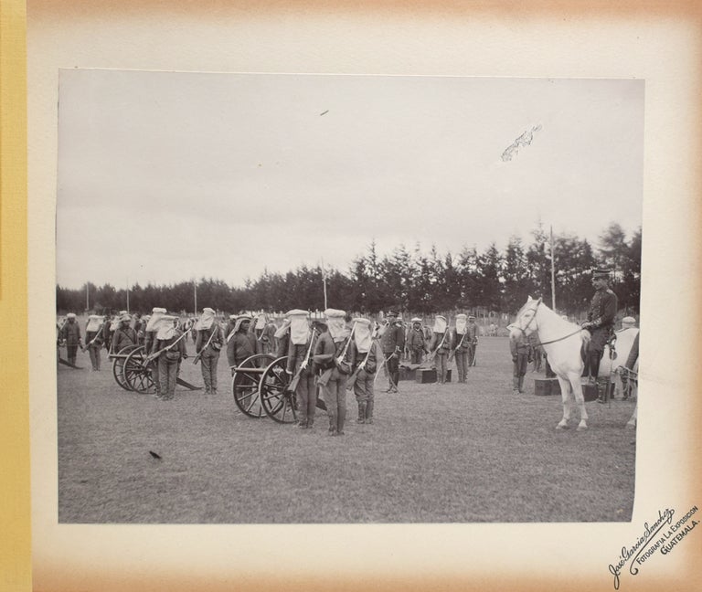 Photo Album with spine title "Maniobras Militares del 20 de Enero de 1903" with 11 mounted photos of Guatemala