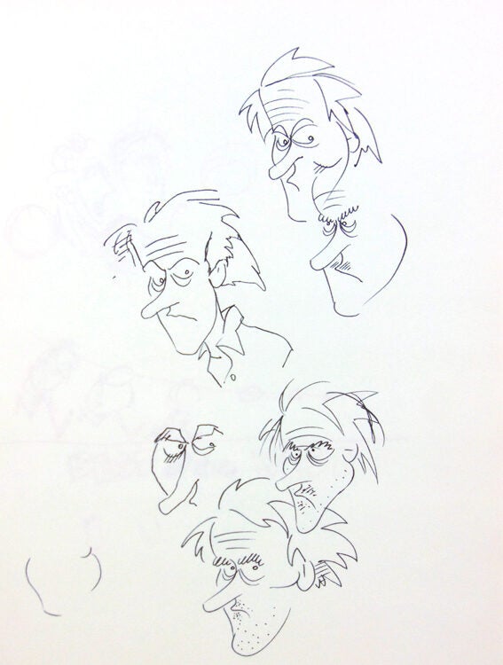 Two sketch books and loose pages containing original drawings and concept artwork
