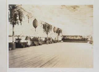 Item #317441 Five vintage photographs of the preparations for an outdoor party on the grounds of...