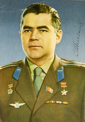 Item #317464 Photo postcard signed, a color portrait of the Soviet cosmonaut in military uniform....