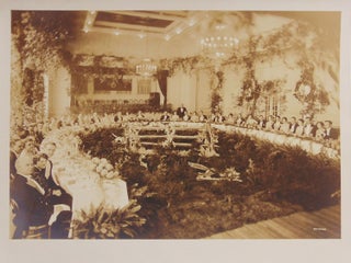 Item #317486 Photograph of a party hosted by Richard Beatty Mellon with guests seated at a long...