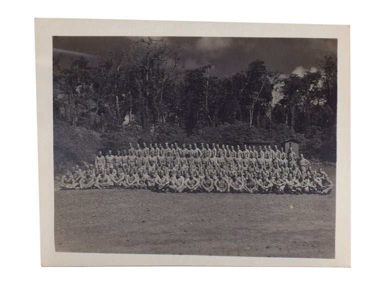 Photo Album of American Samoa, 34 photos (4-1`/2 x 3 inches) of Samoa tipped and 16 family photos of USA tipped in following, 5 loose military photos, 23 enlarged photos of Samoa (5-1/4 x 4 inches) in Eastman Kodak enlargement envelope laid in at the back
