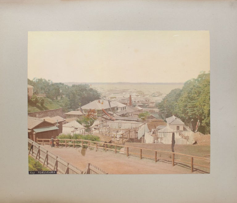 Album of Japanese 8 hand-coloured photographs and 14 others mostly Mexican including birds eye view of the city of Zacatecas, Statues of Guitlahuac, Hotel del Jardin, water carere, La Viga tipped into an album