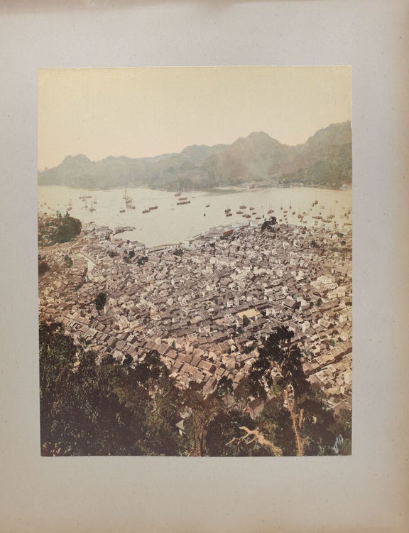 Album of Japanese 8 hand-coloured photographs and 14 others mostly Mexican including birds eye view of the city of Zacatecas, Statues of Guitlahuac, Hotel del Jardin, water carere, La Viga tipped into an album