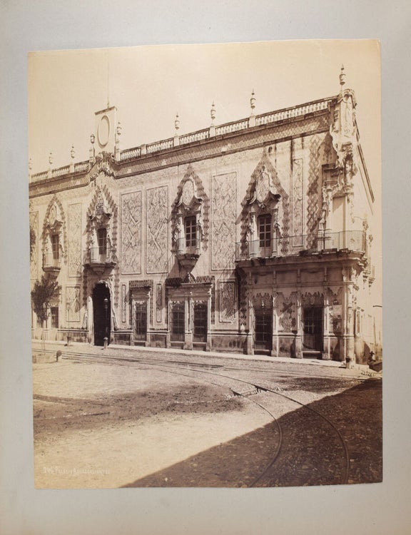 Album of Japanese 8 hand-coloured photographs and 14 others mostly Mexican including birds eye view of the city of Zacatecas, Statues of Guitlahuac, Hotel del Jardin, water carere, La Viga tipped into an album