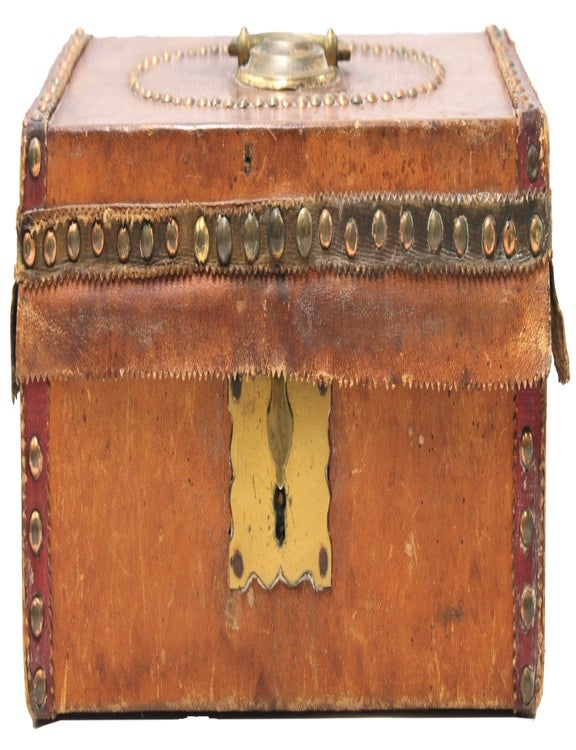 Small leather-covered wooden box with brass lock, decorated with brass tacks, the interior lined with a portion of the Map of the State of Kentucky and the Tennessee Government by Cyrus Harris, engraved by Amos Doolittle for Thomas and Andrews's Boston 1796 edition of Morse's American Geography