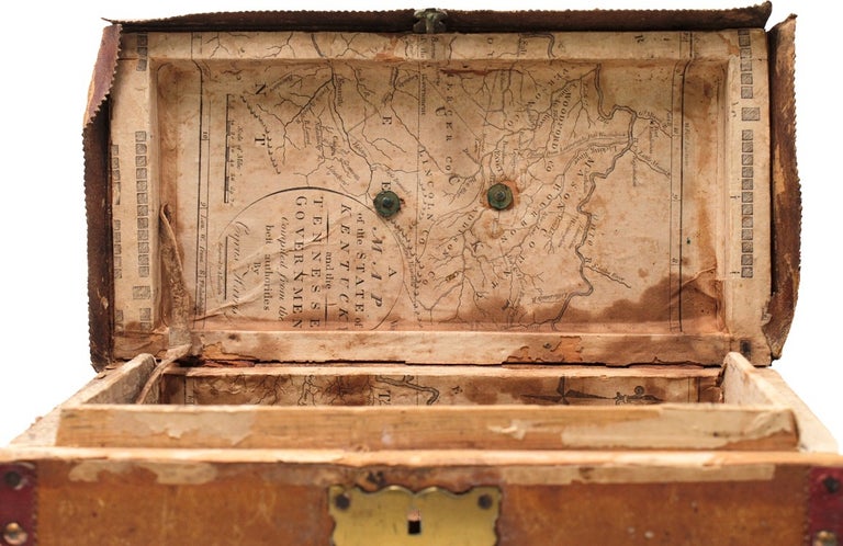 Small leather-covered wooden box with brass lock, decorated with brass tacks, the interior lined with a portion of the Map of the State of Kentucky and the Tennessee Government by Cyrus Harris, engraved by Amos Doolittle for Thomas and Andrews's Boston 1796 edition of Morse's American Geography