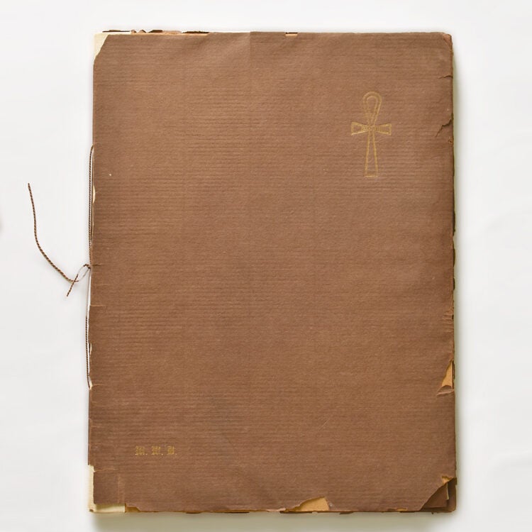 Album with 25 tipped-in photographs with accompanying printed text. no title