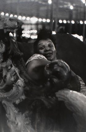 Item #353799 Coney Island Beach People. Untitled [Woman Riding on Carousel]. Harry Lapow