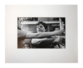 Item #353896 Coney Island Beach People. Untitled [Woman Holding the Pole on the Subway]. Harry Lapow