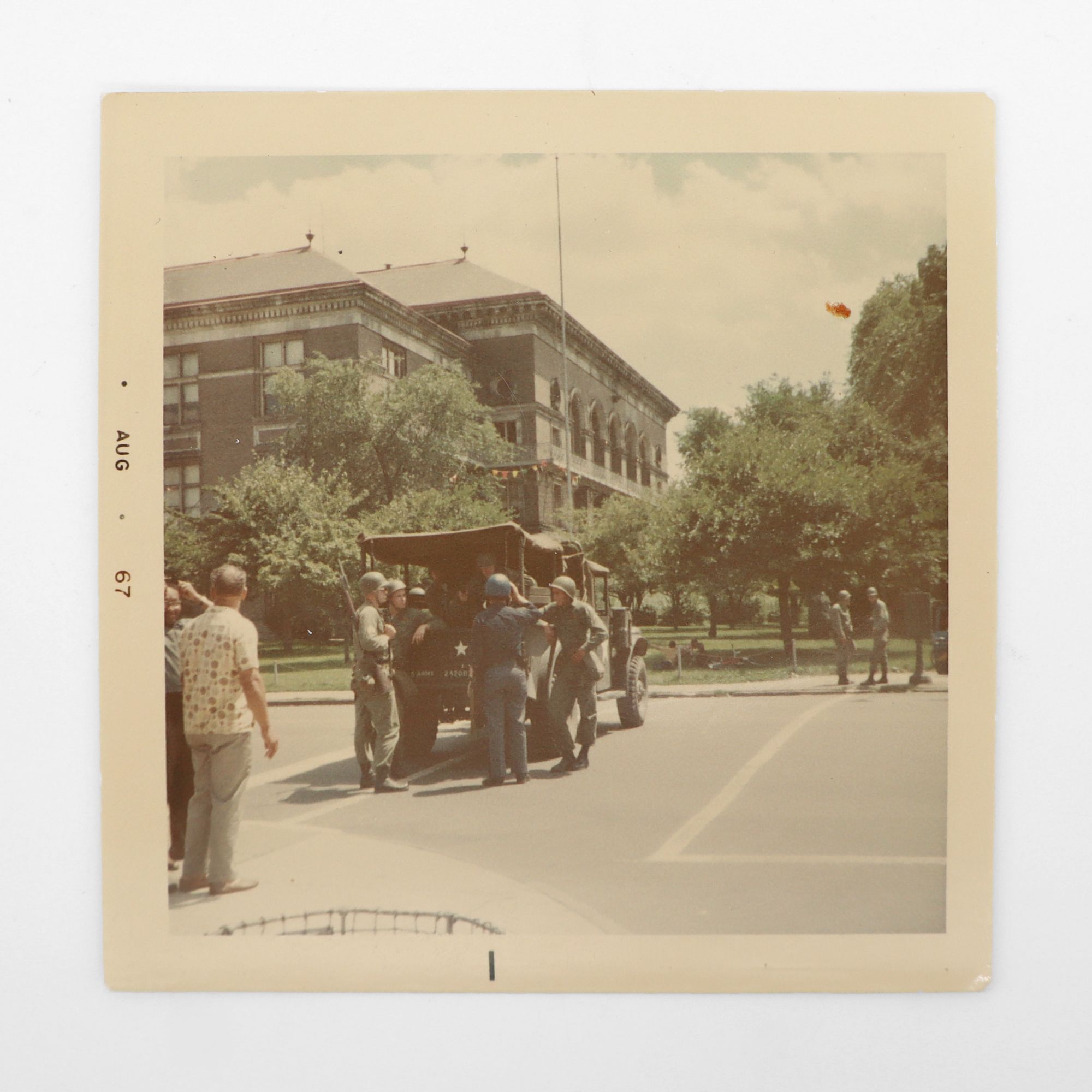Collection of color photographs documenting the aftermath of the 1967 ...