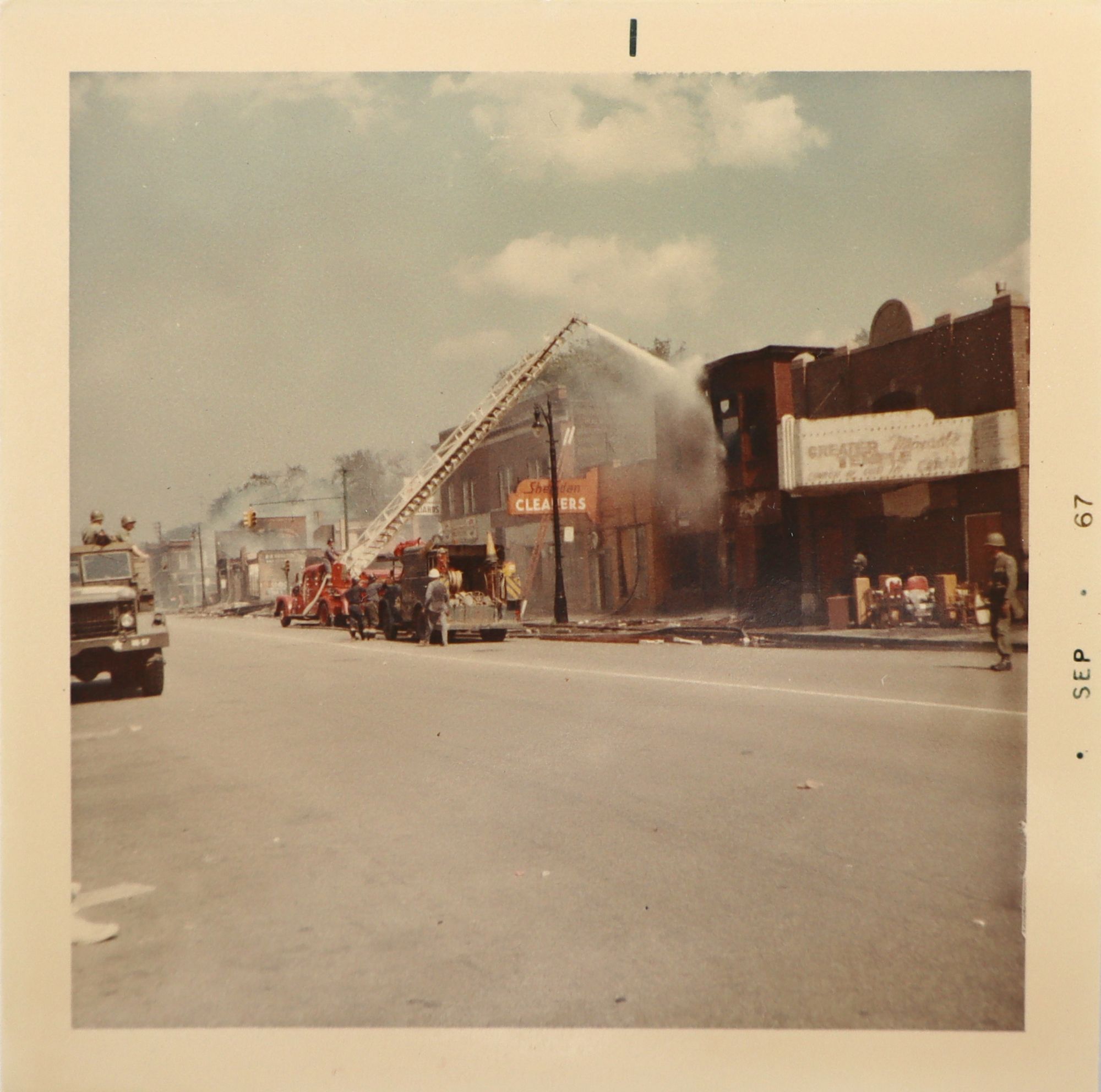 Collection of color photographs documenting the aftermath of the 1967 ...
