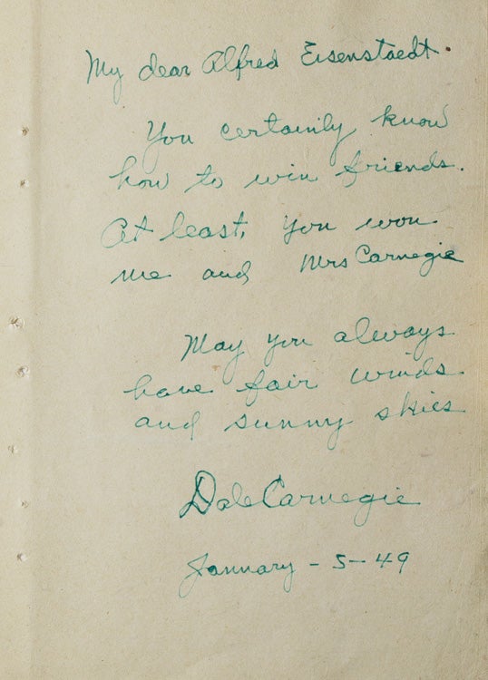 Item #42597 ANS to Alfred Eisenstaedt: "My dear Alfred Eisenstaedt-You certainly know how to win friends. At least, you won me and Mrs. Carnegie. May you always have fair winds and sunny skies, Dale Carnegie January-5-1949." Dale Carnegie.