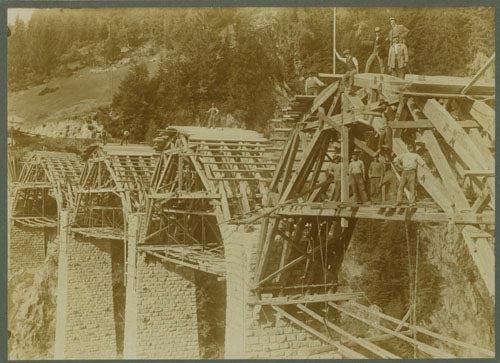 Six Photographs of the construction of an Alpine bridge across a pass in the Swiss Alps
